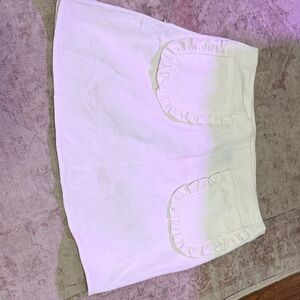 Cider White Mini Skirt with Ruffle Pockets